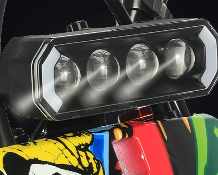 Ridge four-lens front light, bracket and cables with illustrative glow effects.